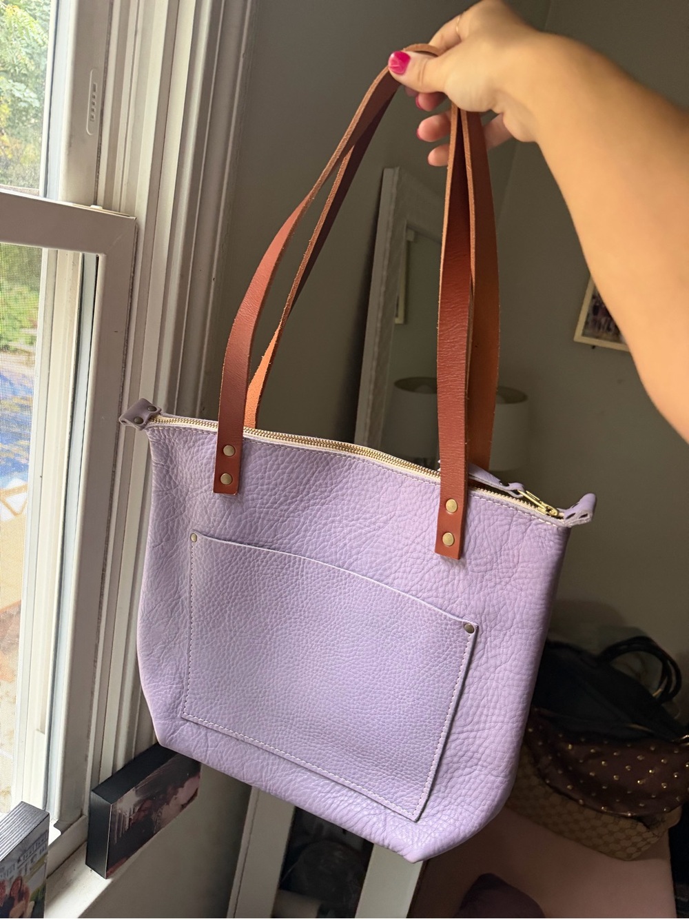 Lavender wisteria Portland Leather medium tote with brown handles.